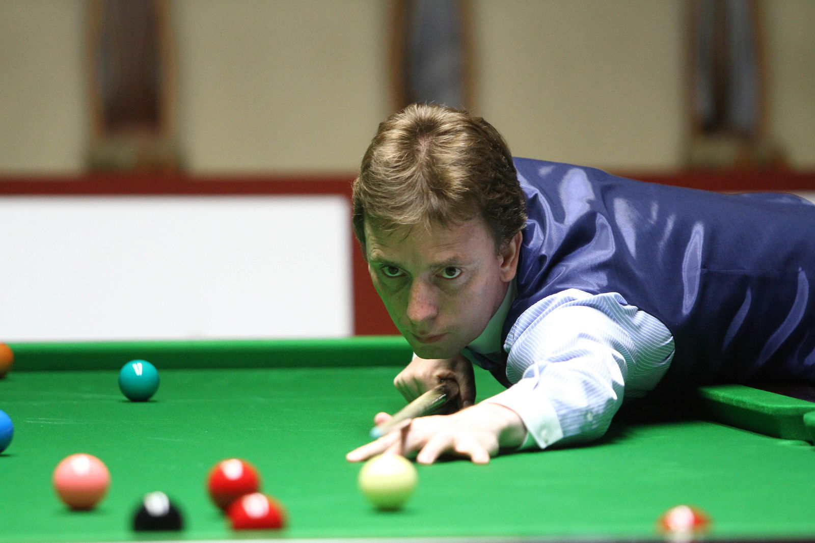 Ken Doherty plays a shot
